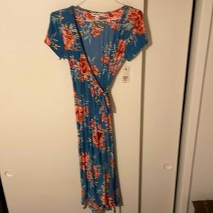 Billabong wrap around dress. Never worn, tags still on.